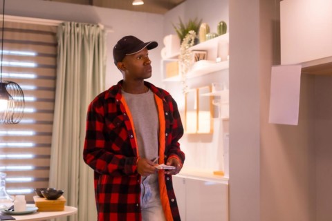 Black ethnic man shopping in a furniture store