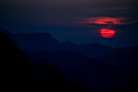 Fiery sunball at sunset with Lechtaler Alps