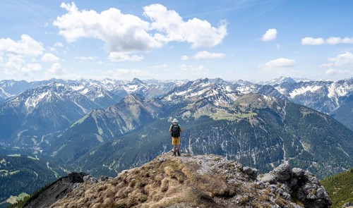 Hiker at the summit of Thaneller