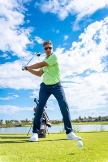 A player playing golf on a golf course