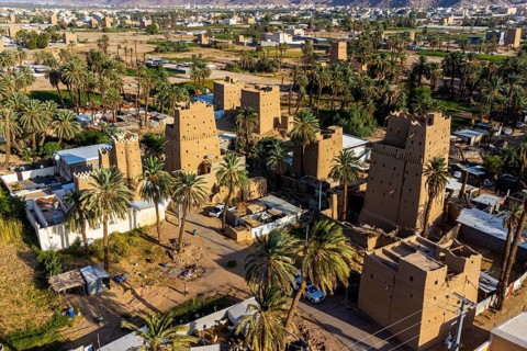 Aerial of traditional build mud towers used a living homes