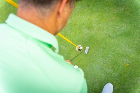 Man playing golf