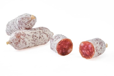 Closeup view of fermented mini parma sausages covered with white mold