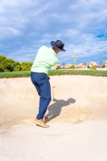 Man playing golf