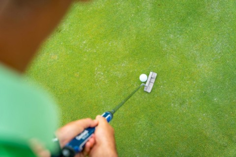 Man playing golf