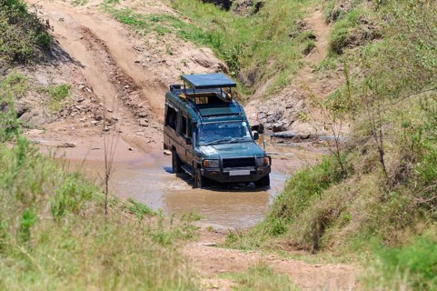 Safari car at river crossing