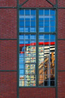 The Colorium reflected in the panes of the DOCK