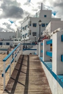 Typical white buildings and restaurants
