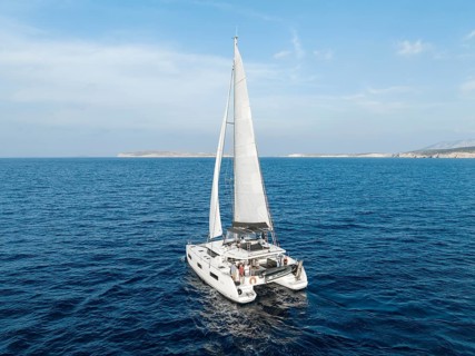 Sailing catamaran in full sail