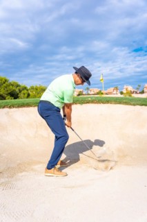 Man playing golf