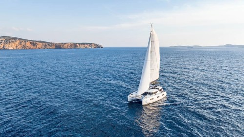 Sailing catamaran in full sail