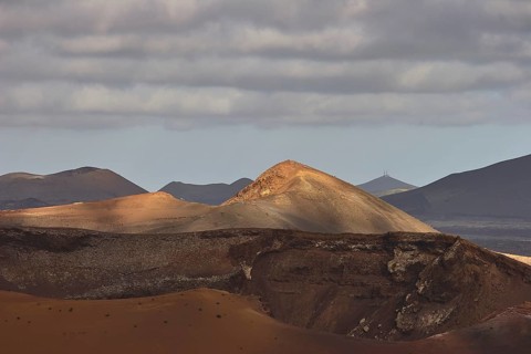 Different coloured lava hills
