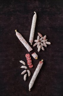 Vertical composition with fermented salami sausages