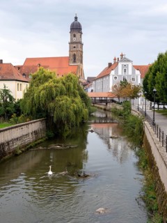 The river Vils and in the background the Basilica of St. Martin
