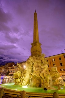 Four-flow fountain in Piazza Navona during a thunderstorm
