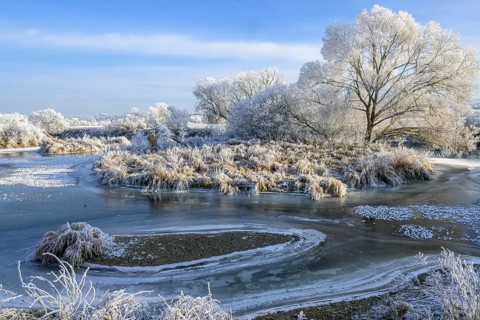 River landscape with hoarfrost and ice