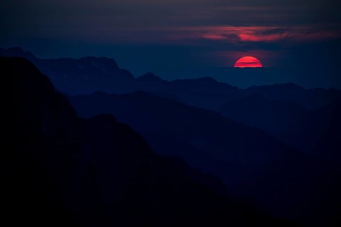 Fiery sunball at sunset with Lechtaler Alps