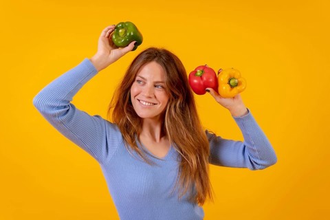 Vegetarian woman with green