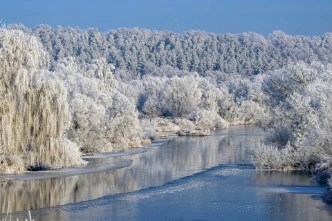 River landscape with hoarfrost and ice