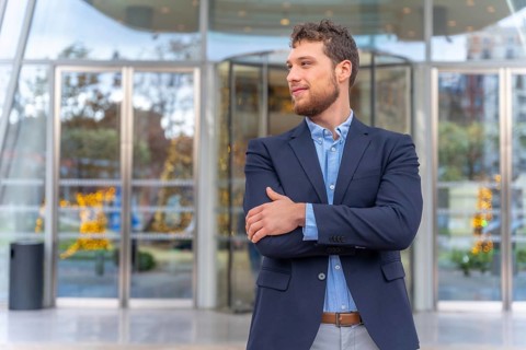 Portrait businessman CEO of a company at the entrance of the office
