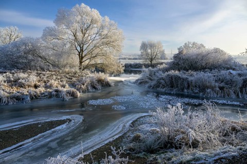 River landscape with hoarfrost and ice