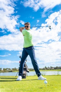 A player playing golf on a golf course
