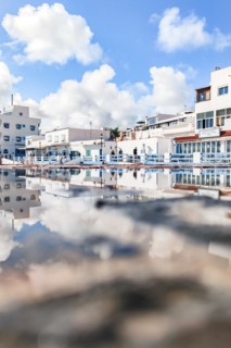 Typical white buildings and restaurants