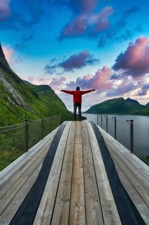 Tourist standing on viewing platform Bergsbotn