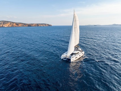 Sailing catamaran in full sail