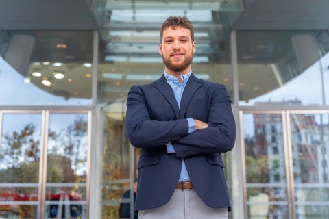 Portrait businessman CEO of a company at glass office entrance