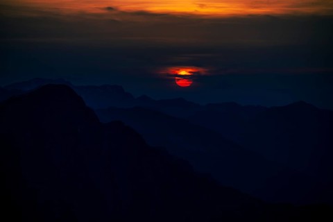 Fiery sunball at sunset with Lechtaler Alps