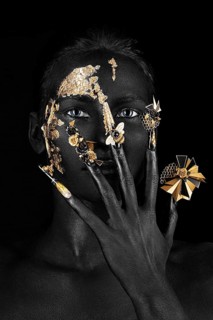 Beautiful woman with black art make-up