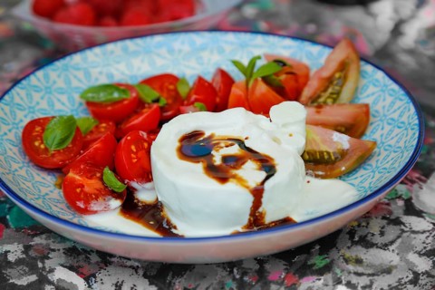 Tomatoes with basil and buffalo mozzarella