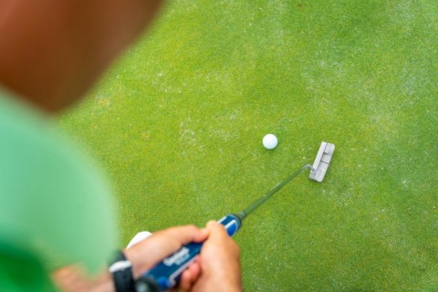 Man playing golf