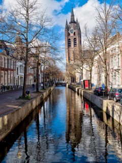 Oude Kerk Reformed Church and Canal with Reflection