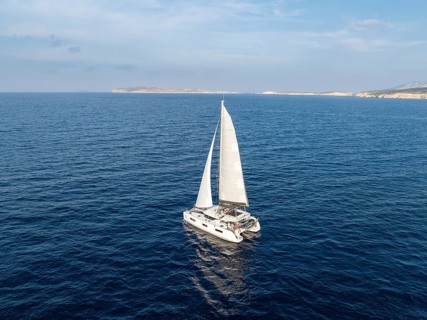 Sailing catamaran in full sail