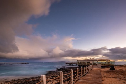 Long exposure at sunrise on the coast near Corralejo