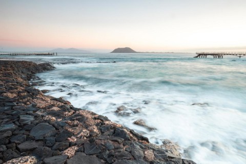 Long exposure at sunrise at the coast near Corralejo