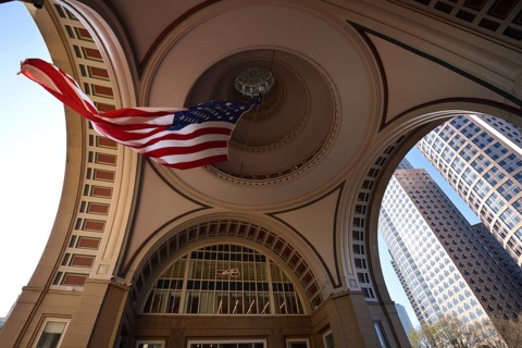 American flag in the arch of Rowes Wharf