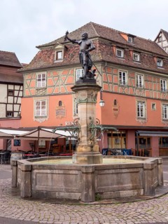 Schwendi Fountain on the Pl. de lAncienne Douane square with bronze statue of General Lazarus von Schwendi
