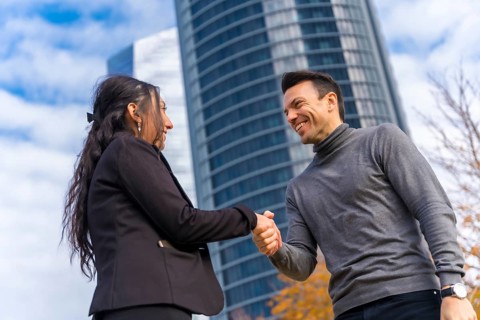 Multi-ethnic businessman and businesswoman