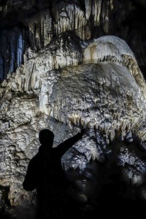 Guide in front of flowstone
