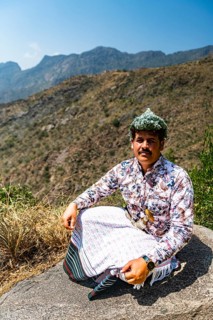 Traditional dressed man of the Qahtani Flower men tribe in the coffee plants