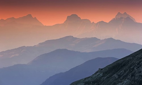 Aerial view from the mountain peak Edelweisspitze towards Zell am See at sunset