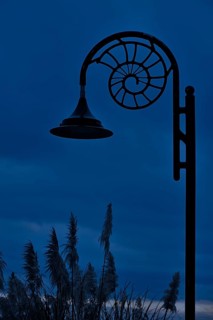 Ammonite-design streetlamp along the promenade at Lyme Regis