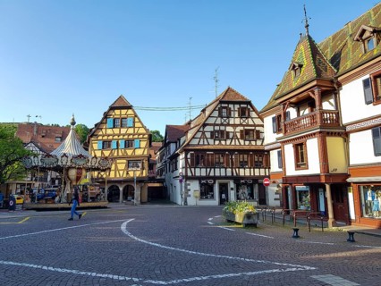 Carousel Carousel Adam and half-timbered houses in the square Pl. de l'Etoile