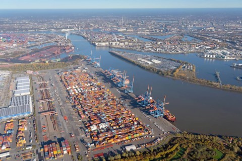 Aerial view of the Container Terminal Altenwerder behind it the city centre of Hamburg