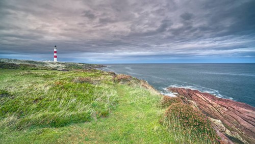 Tarbat Ness Lighthouse with cloudy sky