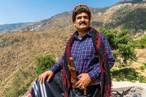 Traditional dressed man of the Qahtani Flower men tribe in the coffee plants