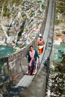 Prayer flags at the suspension bridge over the Seti River